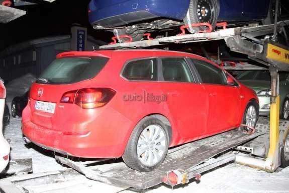 Facelifted Opel Astra Sports Tourer test prototype side-rear view