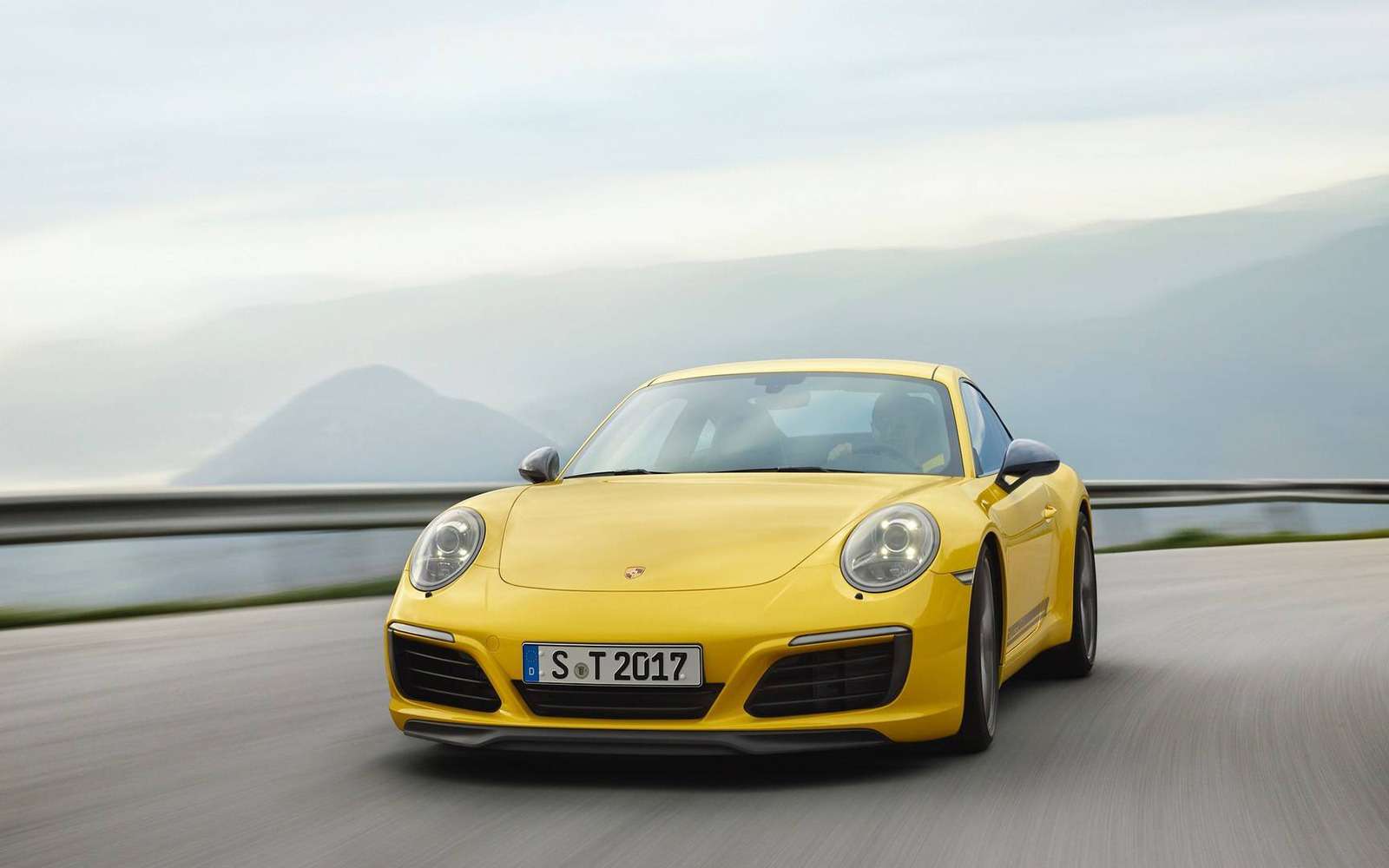 Чем меньше, тем лучше: Porsche представила 911 Carrera для пуристов — фото 808042