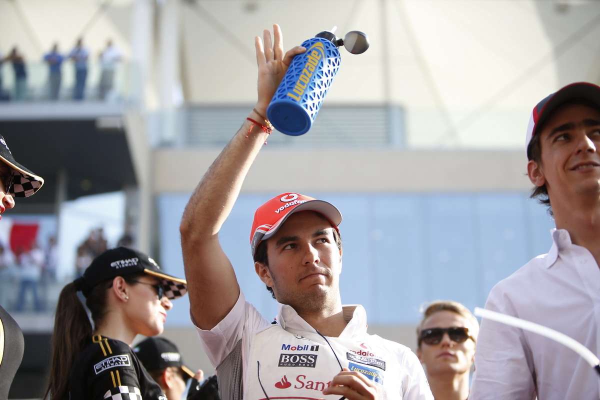 Sergio Perez waves to the crowd